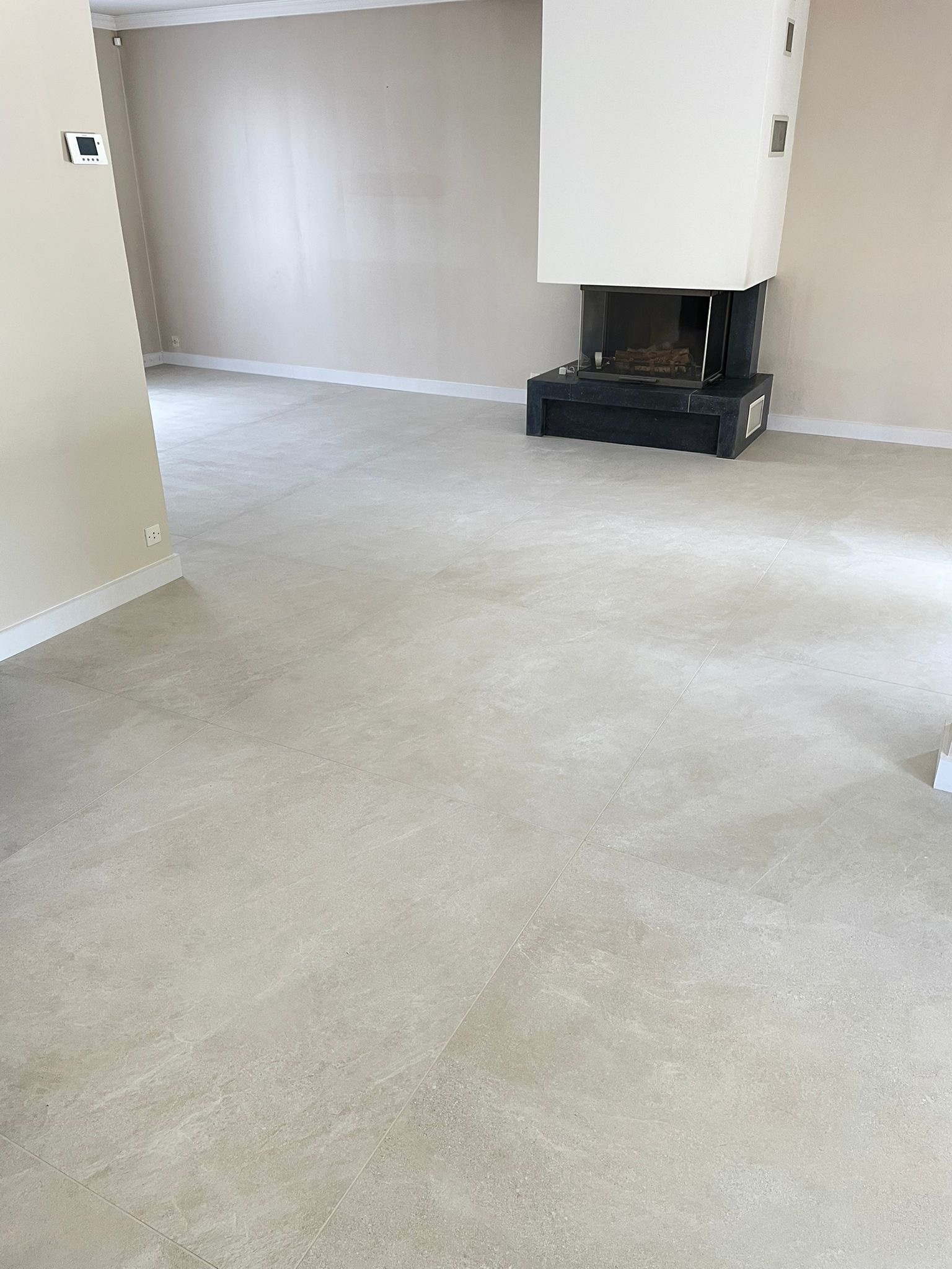 Carrelage posé sans baguette de finition par CS Création dans la métropole lilloise
